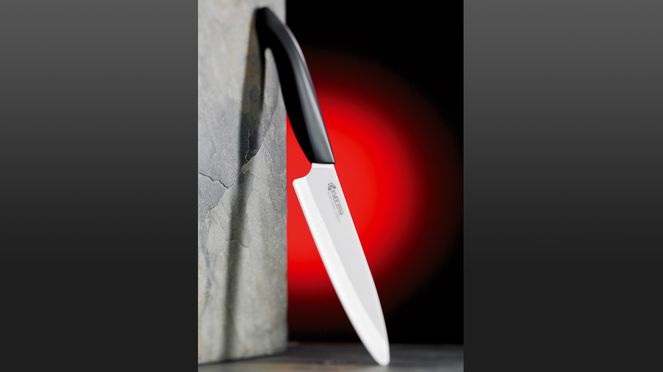 
                    Black and white ceramic universal knife