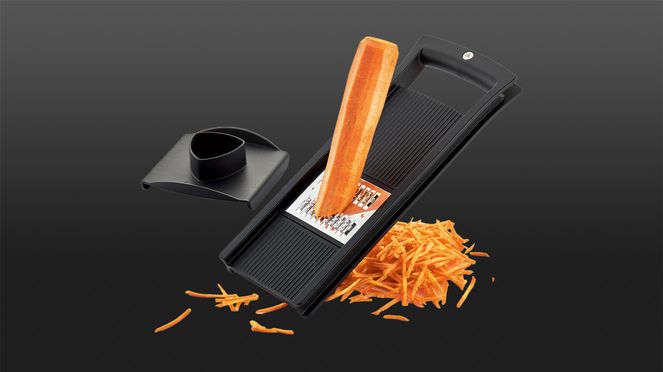 
                    The compact triangle julienne slicer cuts vegetables into julienne strips and slices with ease and precision